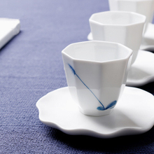 Copo de chá vital da porcelana branca brilhante do nível superior, copo do octógono cerâmico