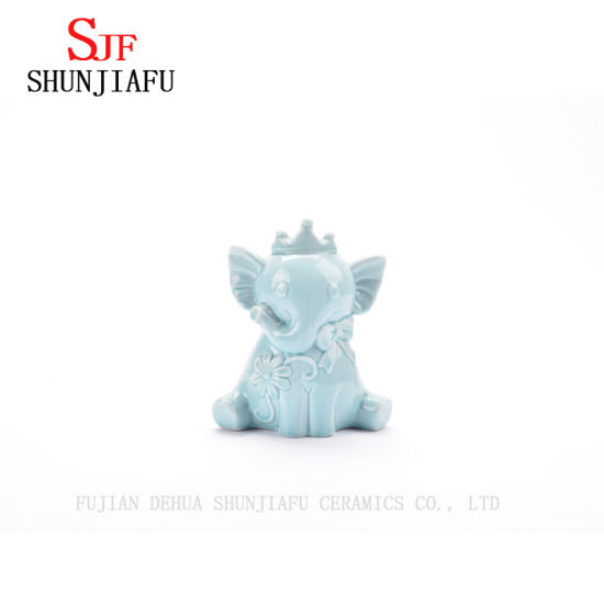 O elefante de cerâmica com Crowen para decoração de casa / ornamento