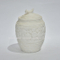 Canister de cerâmica branca, um bom assistente de armazenamento para decoração de casa