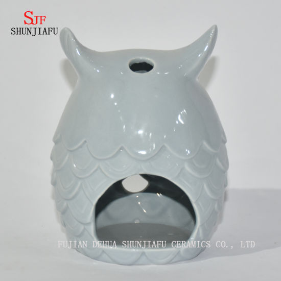 Castiçais em forma de corujas / C