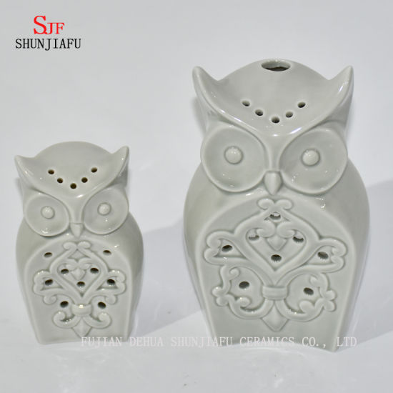 Castiçais em forma de corujas / B