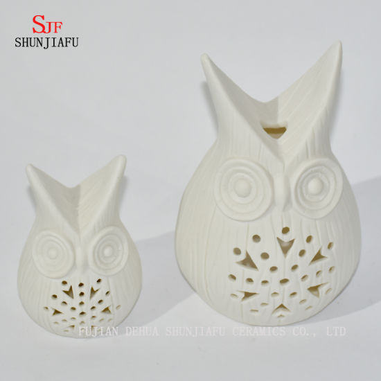 Castiçais em forma de corujas / E