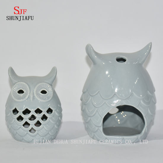 Castiçais em forma de corujas / C