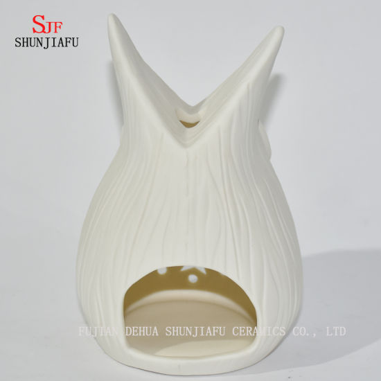 Castiçais em forma de corujas / E