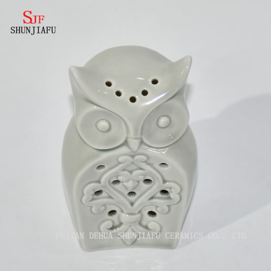 Castiçais em forma de corujas / B