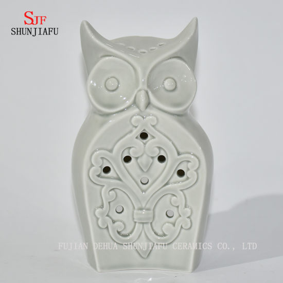 Castiçais em forma de corujas / B