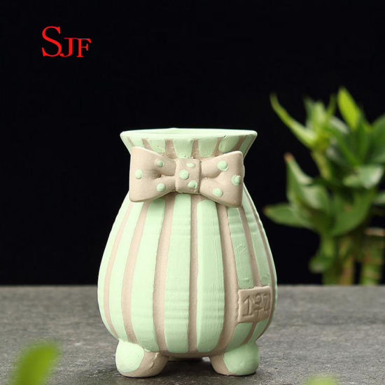 Vaso de cerâmica pintado à mão simples criativo de cerâmica.