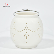 Lanterna de tempestade de luz de chá de cerâmica branca - suporte de vela