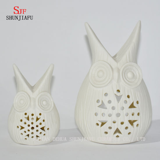 Castiçais em forma de corujas / E