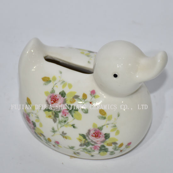 Pato pequeno de cerâmica com decalques de flores Mealheiro