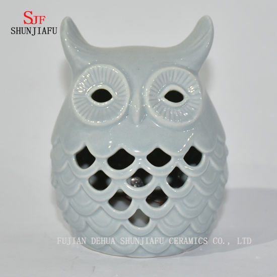 Castiçais em forma de corujas / C