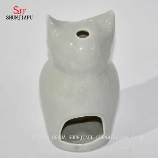 Castiçais em forma de corujas / B