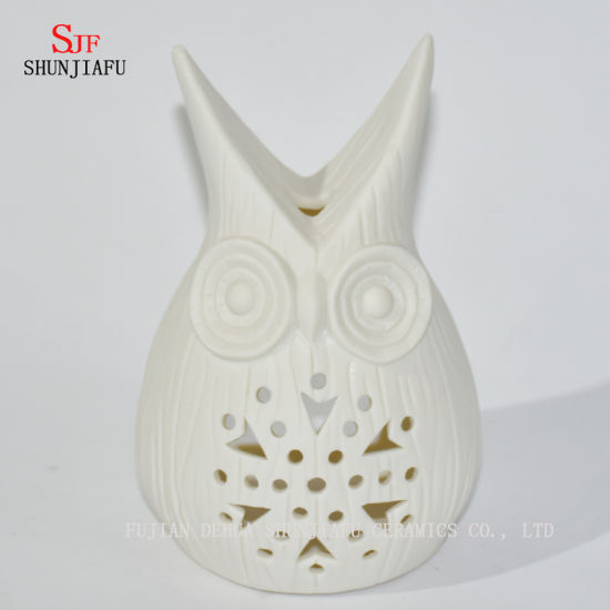 Castiçais em forma de corujas / E