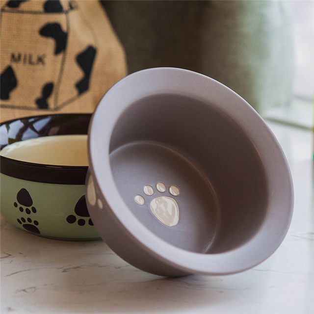 Impressão inferior da tigela Imagens de osso Alimentador de animal de estimação de cerâmica Tigela de cerâmica para cães Circular