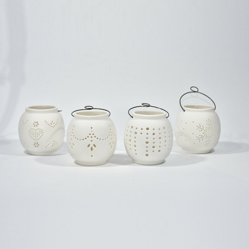 Porcelana branca portátil Circular Hollow Candle Cup Ceramic Pattern Hollow out Creamic Veller