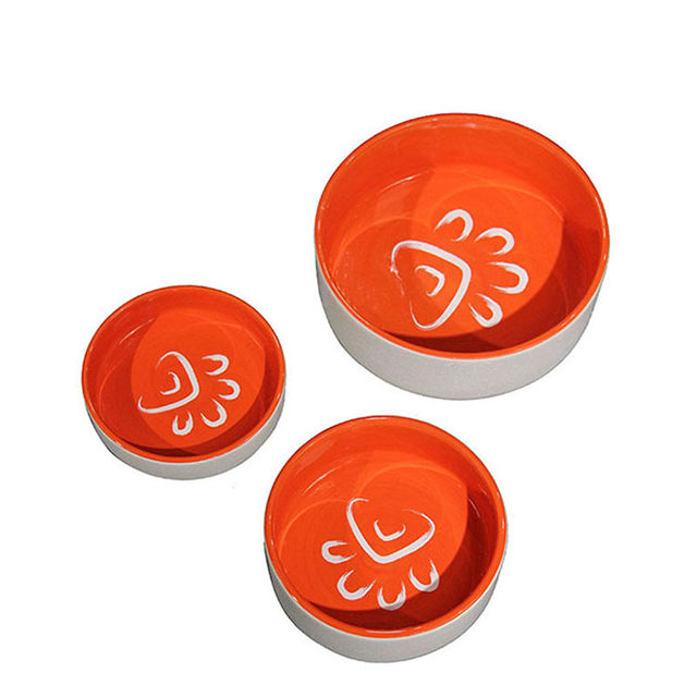 Bacia dentro da bacia cerâmica cor-de-rosa do cão e do gato do alimentador cerâmico cor-de-rosa do animal de estimação