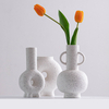 Criatividade e inovação Design Design Vaso de porcelana Decorações de desktop em casa Os grânulos de areia branca sentem vaso de cerâmica