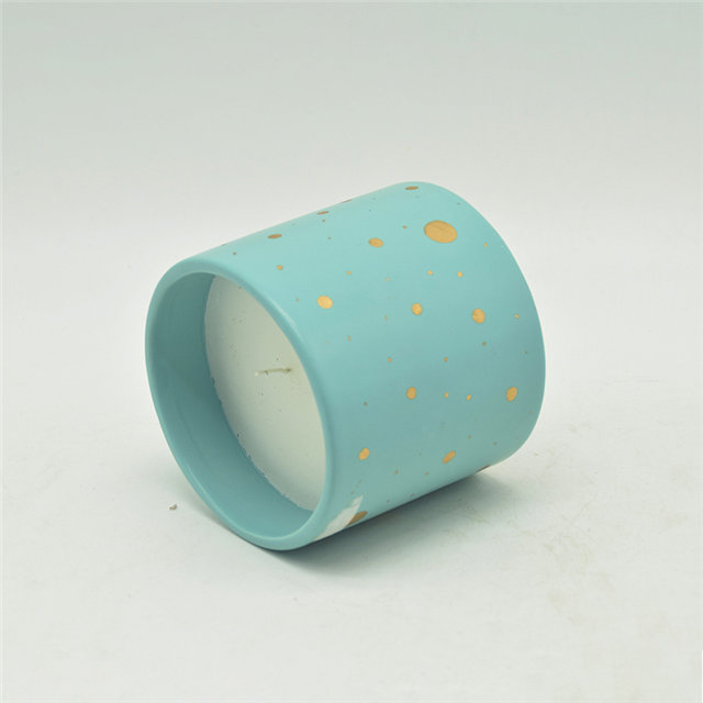 Copos de vela de cerâmica manchados de azul e dourado