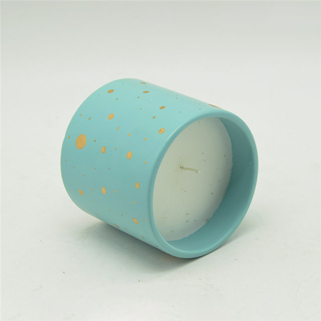 Copos de vela de cerâmica manchados de azul e dourado