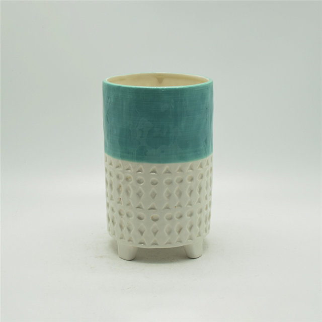 Expressão verde e branca dos desenhos animados personagem vaso de cerâmica de quatro pernas