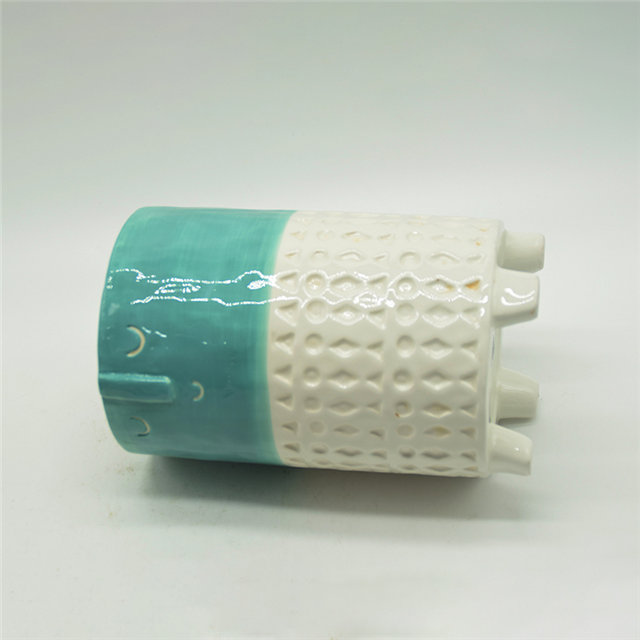 Expressão verde e branca dos desenhos animados personagem vaso de cerâmica de quatro pernas