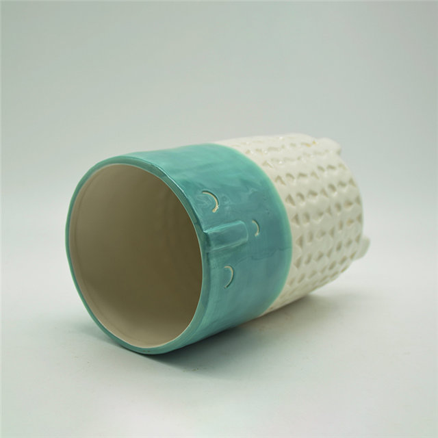 Expressão verde e branca dos desenhos animados personagem vaso de cerâmica de quatro pernas