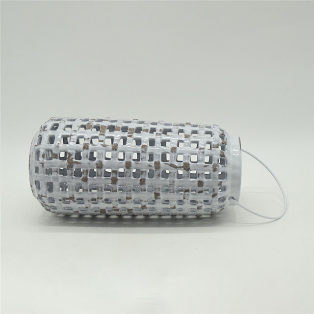 Decoração de mobiliário doméstico Cilindro de cerâmica cinza claro Estilo de abóbora Escavar Lanterna de furacão